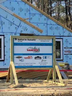 The sponsorship sign at the build site in Saco.