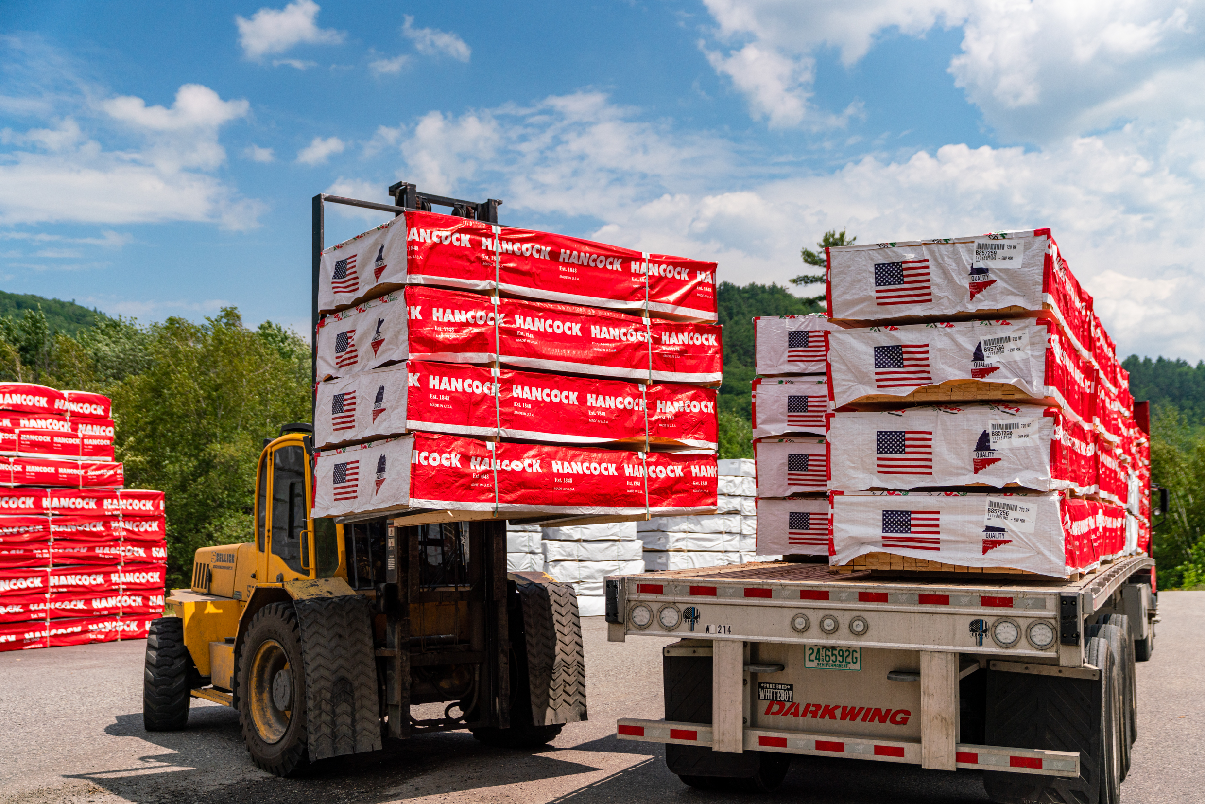 Boards getting loaded onto truck